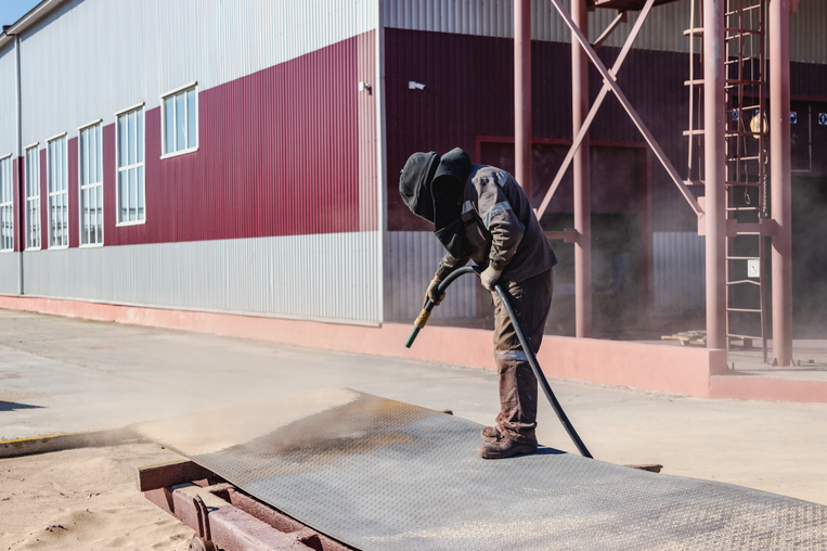 Preparación de superficie mediante sandblasting